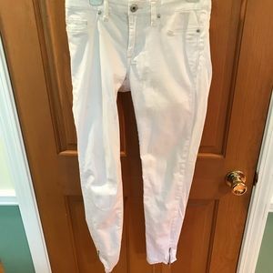 Blank NYC skinny white studded jeans.